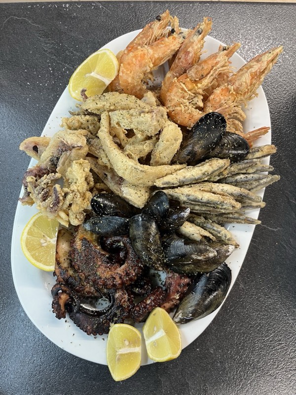 Mixed seafood platter with shrimp, calamari, mussels and grilled octopus