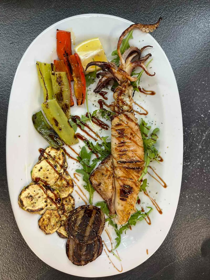 Whole grilled squid with vegetables